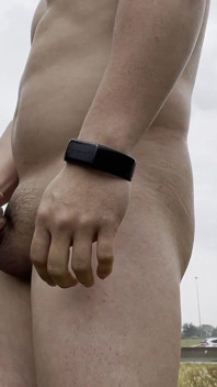 Rain-drenched Highway Exhibitionist: Muscular Stud Strips Naked Amid Rushing Traffic, Flexes, and Explodes in Ecstasy