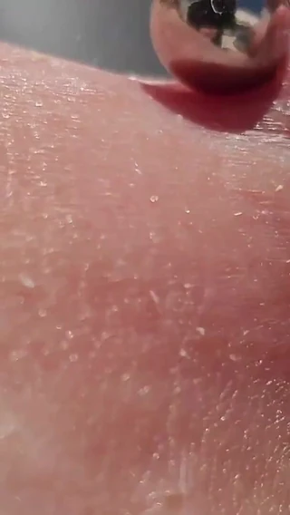 Anna Booty: Playing Pierced Nipples Close up on Balcony