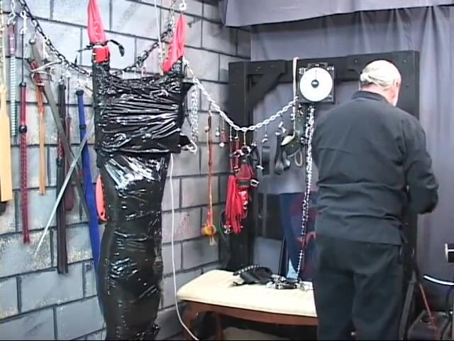Maledom Austria: Fullbody tape covering and bondage