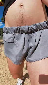 Fit Guy Walks in Short Shorts Without Underwear
