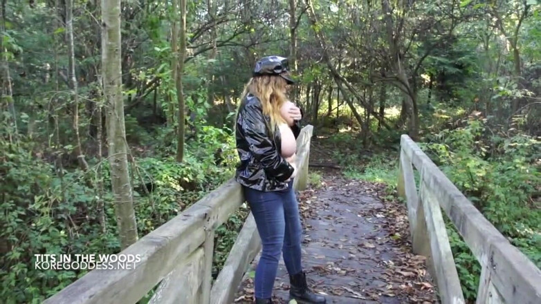 Kore Goddess: Huge tits in a rope harness roams the woods