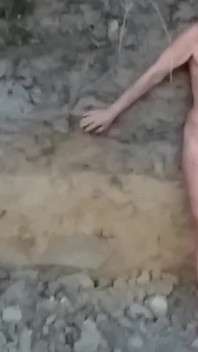 Naked Granny in a Gravel Pit!