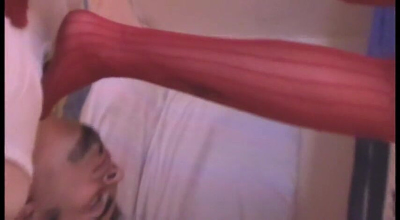 Femdom Austria: Trampling heels in red stockings