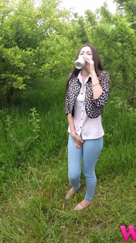 Skinny Brunette with Full Bladder Has to Pee in the Forest and Wet the Tall Grass Touching Her Wet Pussy