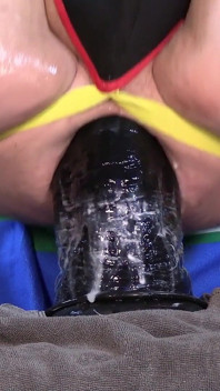 5 Minutes of a While Ride on This Huge Dildo with White Lube Showing How Deep...