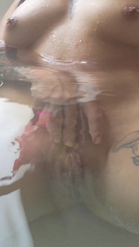 A Slut in a Hot Tub Gets Fucked Hard by Two Men and Gets Cum