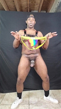 Big Dicked Stud Jerking Huge Cock in Rainbow Print Jock