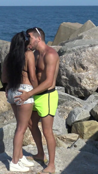 Hot busty Latina sucks dick in the beach