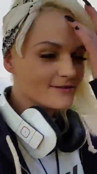 Alexa Gold in Front of a Hospital