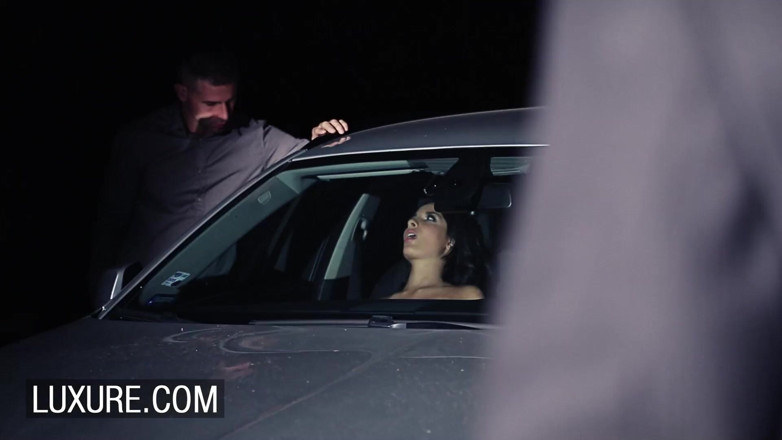 Luxure: Gangbang with a busty brunette in a parking