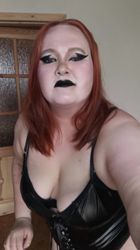 Goth Girl in a Leather Bodysuit