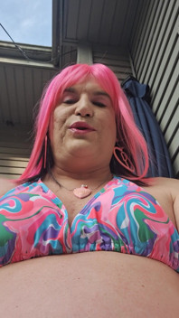 Sitting Outside Sunbathing and Teasing Men!