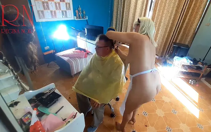 Regina Noir: Nudist barbershop. Nude lady hairdresser in an apron, the client...