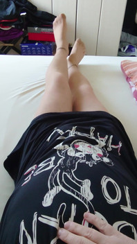 Nylonjunge in the Nightgown and Tights in Bed