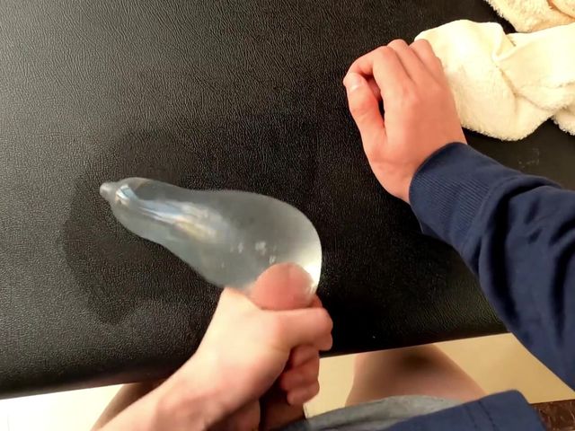 A Single Boy Masturbates and Moans at Home, Shooting Into a Water Ball in a Condom (Bbc dely)