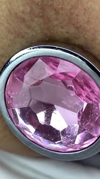 Penyisipan butt plug - close up