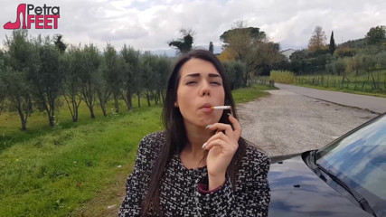 Smokin Fetish: Outdoors smoking cigar from sexy brunette