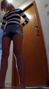 Skinny Redhead Pee in Her Short Jeans