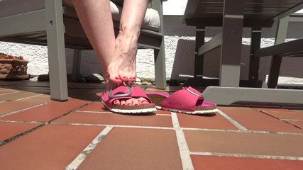Lady Victoria Valente: Shoe play, toe wiggling, wrinkled soles on the garden terrace