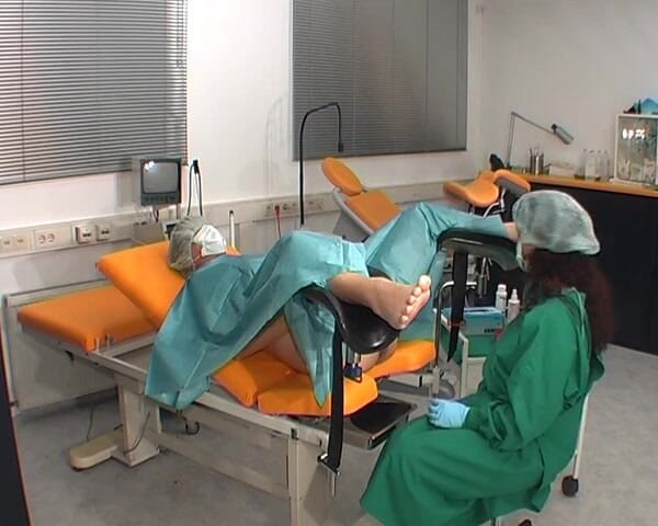 Rubber & Clinic Studio - 1ATOYS: Nurse in green surgery outfit