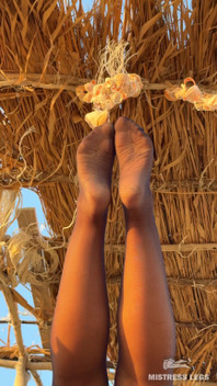The Best View on the Beach Is Not the Sea, but My Feet in Black Tights Hanging Over Your Head
