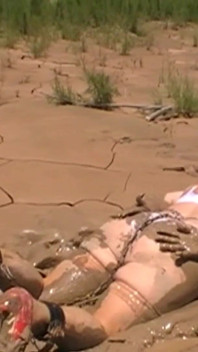 Julie Cunningham in Lingerie Wriggles Hard in Mud Hogtied with Chains. Sploshing Dirty Whore. Huge Tits Covered in Mud.