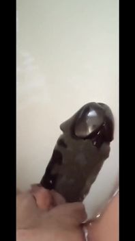 I Play with a Nice Black Dildo, I Rub It Well on My Clit and Then I Put It Inside My Pussy
