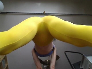 Long Toe Sally Big Buns: Yellow stretch pants squats