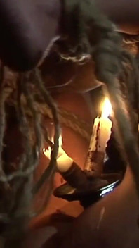 Witch Hangs Upside Down and Gets Drizzled with Black Wax