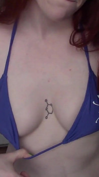 Tattooed Redhead Bikini Tease