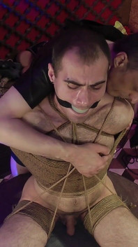 Zeus Ballgagged and Bondage in Rotate Table