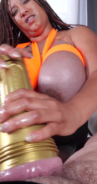 Danni Strokes a Big Cock with Help