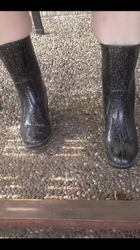 With Rubber Boots Outdoors