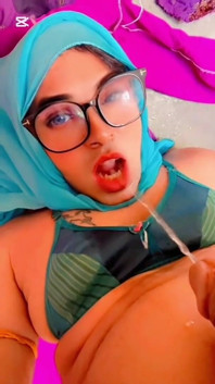 Beautiful Hijabi Transgender Peeing in Mouth