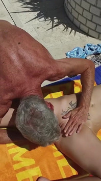 Oiled up Hot Threesome at the Pool