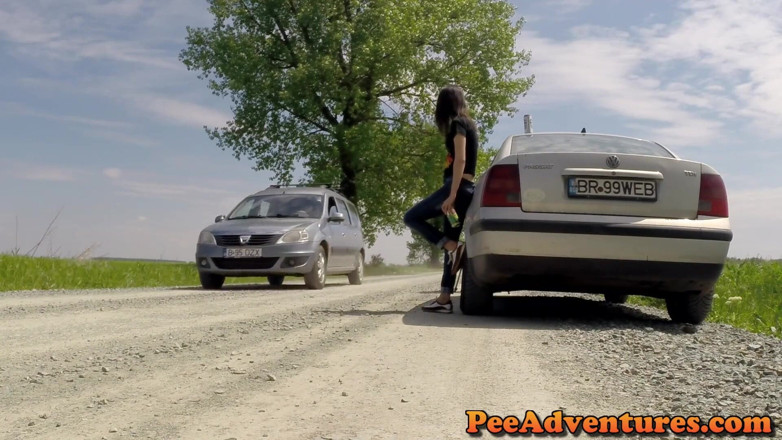 Pee Adventures: Sexy brunette pissing her pants outdoor