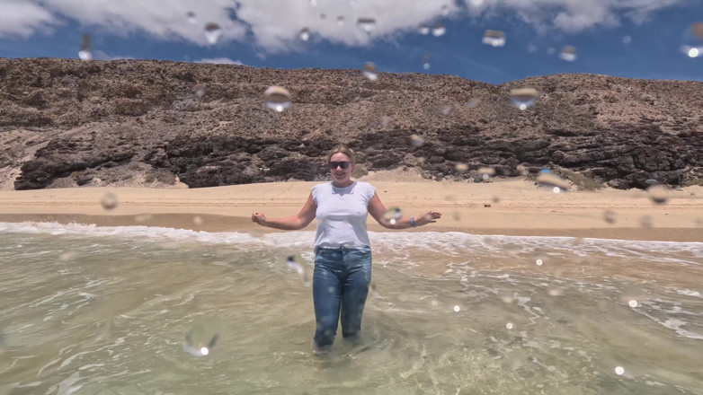 Emma Voyeur: Girl Wetting Jeans in the Ocean and Swimming in Wet...