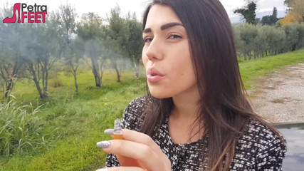 Smokin Fetish: Outdoors smoking cigar from sexy brunette