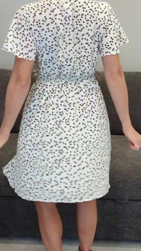 Sadie in a White Dress with Hearts and Red Heels