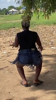 African Ebony Sexy Black Girl Dances in Public with Laughter