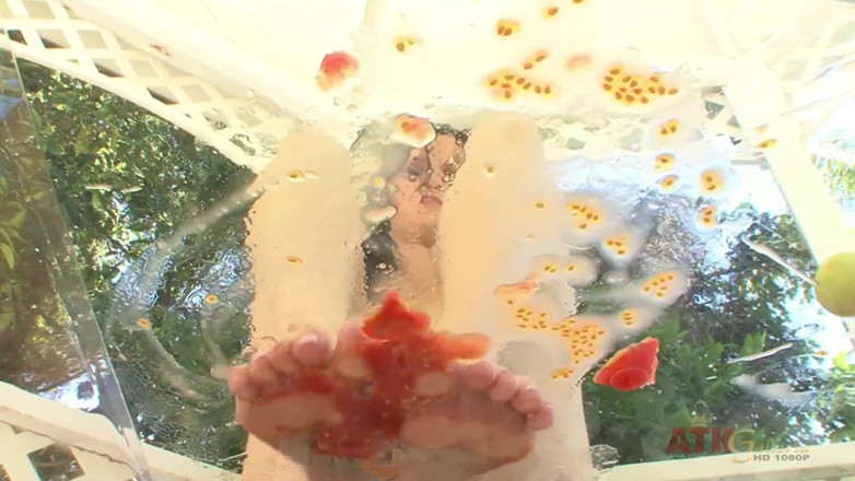 ATKIngdom Fans: Brunette teen squishes vegetables outdoor