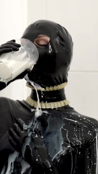 Rubber Slut Swallowing and Bathing in Milk