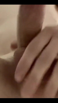 Masturbating