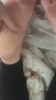 Playing with Friends Soles, While She's Reading.