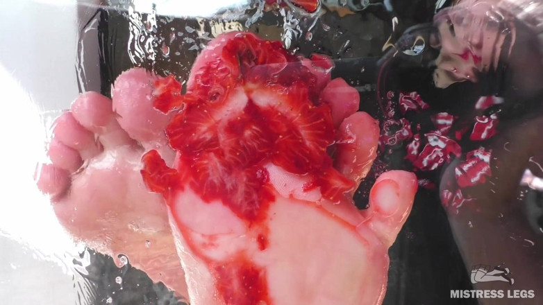 Mistress Legs: Mistress barefoot soles rubbing against the glass and squeezing strawberries
