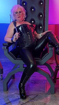 Latex Clad Mature Dominatrix Cracks Whip in Ecstatic Poses