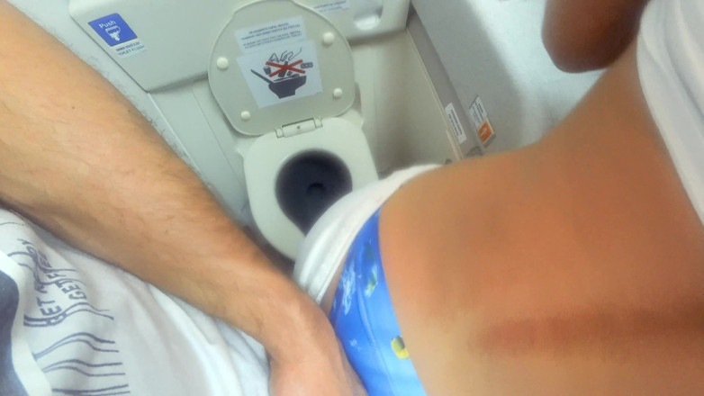 Mia Bandini: Risky fuck in the airplane's lavatory