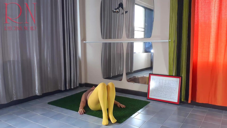 Regina Noir: Regina Noir. Yoga in yellow tights doing yoga in the...
