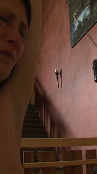 Chained Slaves Whipped in the Dungeon