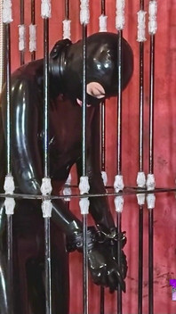 Imprisoned Rubber Slut Has to Give a Blowjob